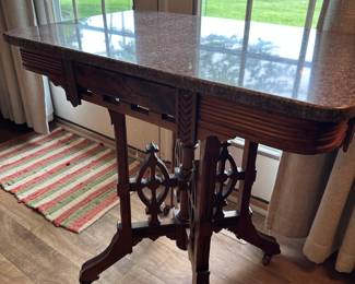This is a fantastic Eastlake solid Oak hall table with marble top