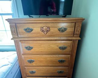 This is a great tall, five drawer dresser