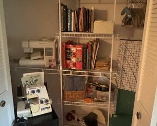 This cause it is filled with a lovely sewing machine, a surger and accessories