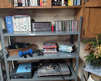 Here we have DVDs VHS CDs, VHS and DVD players