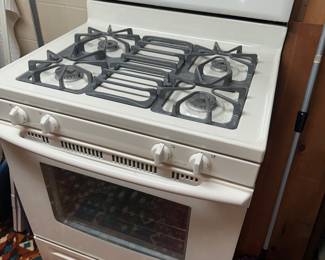 This gas stove in the basement is an excellent condition and IS for sale