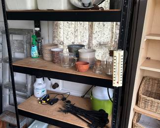 The garage has typical garage items, garden tools, etc.