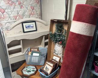There’s also a twin bed in the basement with a nice headboard