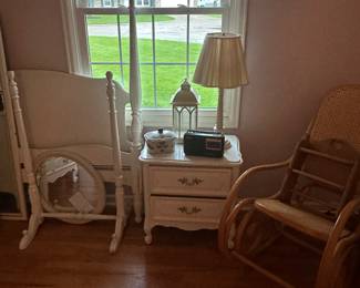This bedroom also holds a beautiful four piece French provincial style young girls bedroom! It is complete with a full-size for a poster bed, dresser with bookcase on top, nightstand, and a standing mirror
