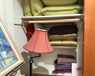 Floor Lamp, Blow-up Mattress, Luggage, Throw Blanket, Throw Pillows.