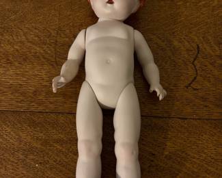 Showing Bisque Jointed Doll - front