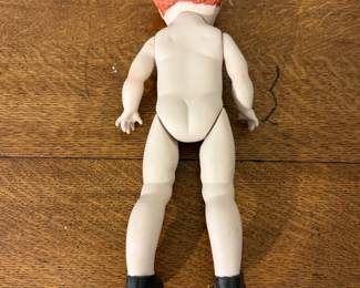 Showing Bisque Jointed Doll - back