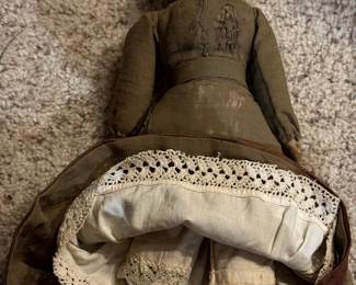 Antique Porcelain Head Doll with Composite Body.