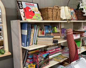 Assorted Books, Sea Grass Basket, Roll of Fabric
