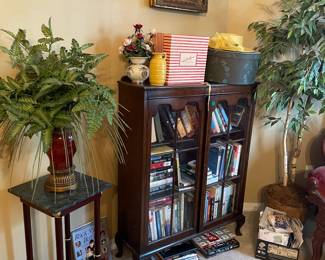 Books, plants, locking cabinet