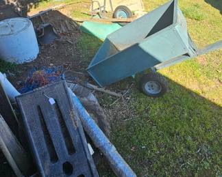 Ramps, wheelbarrow, lawn dump trailer, road signs
