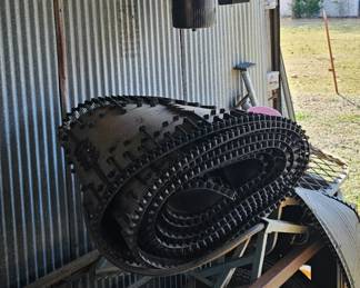 Trailer tire spares, deer feeders, angle iron, and tubing