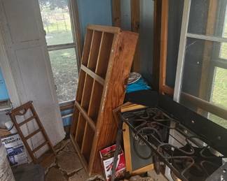 Two burner propane outdoor stove, pocket doors, display shelves