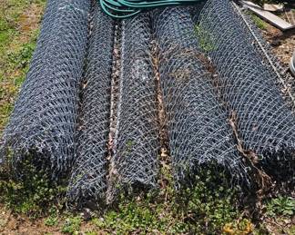 chainlink fence, posts and poles are there as well