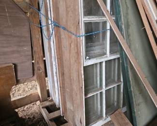 Salvaged single-pane antique windows in frame