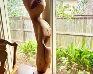 Modernist apple wood sculpture, artist known only to have been educated at Randolph-Macon College in Ashland, Virginia.  Mrs. Gray states she remembers this piece being entitled “Ritual Singer No. 2”