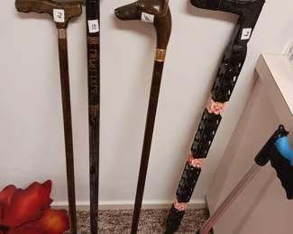 Nice selection of interesting carved walking stick canes
