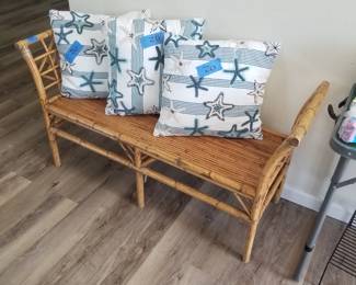 Rattan bench; Sigrid Olsen pillows