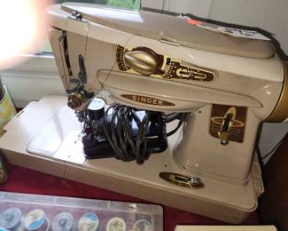 Portable Singer Sewing Machine and Case. 'Rocketeer' circa early 60's. Space Age design.
