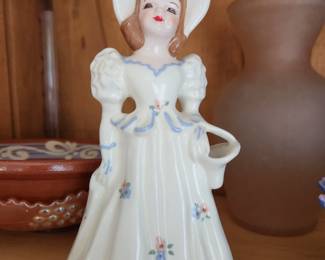 Girl with Basket by Florence Ceramics - Pasadena, California. Circa 1950's.