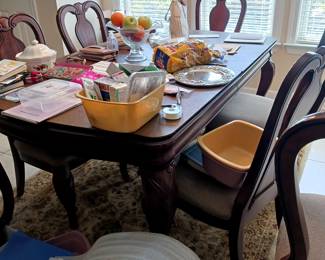 Large kitchen table with two more leaves.  6 chairs.  Beautiful 