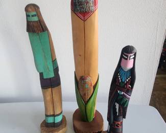 Carved wooden figures signed,
Corn man