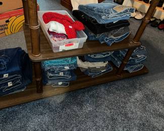 Lots of denim jeans