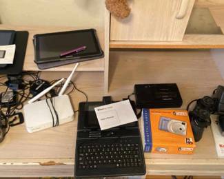 Polaroid Camera, Binoculars and Tablets Oh My