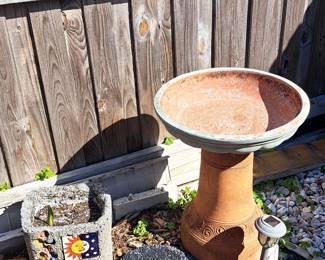 Terracotta birdbath