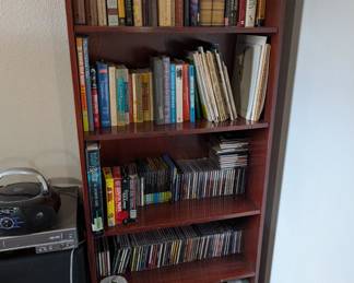 Tons of books on 3 book Shelves