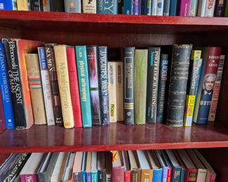 Tons of books on 3 book Shelves