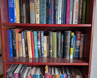 Tons of books on 3 book Shelves