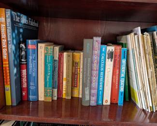 Tons of books on 3 book Shelves