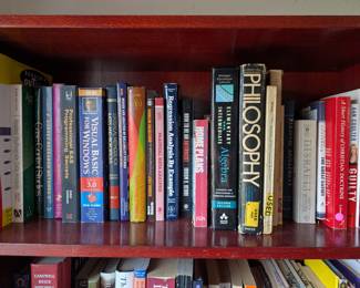 Tons of books on 3 book Shelves