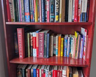 Tons of books on 3 book Shelves