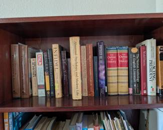 Tons of books on 3 book Shelves