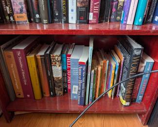 Tons of books on 3 book Shelves