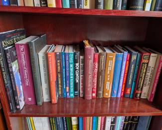 Tons of books on 3 book Shelves