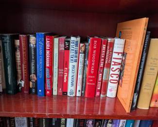 Tons of books on 3 book Shelves