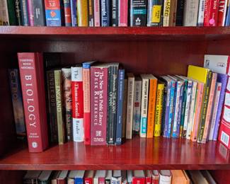 Tons of books on 3 book Shelves
