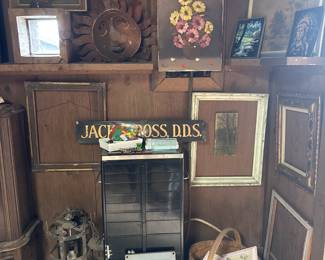 Antique porcelain multi drawer Dental cabinet, antique Jack Ross DDS sign paintings and nmore paintings 