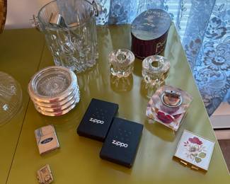 Living Room
Zippo lighters, glass coasters, glass candle holders, glass ice bucket