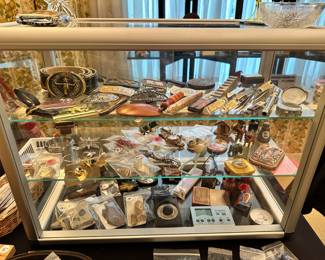 Belt Buckles, Can Openers, Sterling Jewelry, Watches, Compacts, Fossils, etc.