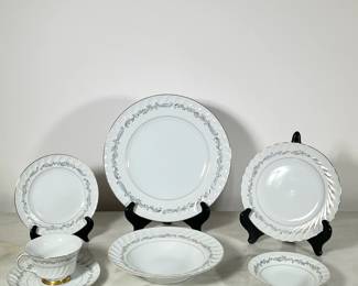 Meito China Service | Service for twelve, icluding cups and saucers, dinner plates, low bowls, and lunch or dessert plates.
