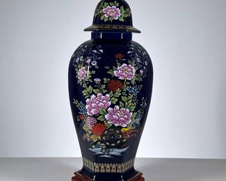 Cobalt Hexagonal Vase | Lidded jar with gilt and enamel painted decoration, on a conforming wooden stand. - h. 21 x dia. 8 in (overall with stand)


