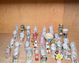 (32pc) FLORAL PORCELAIN SHOES | Mixed lot of flower decorated porcelain & other ceramic shoe, by various makers. - h. 3.75 x w. 2 x l. 5.5 in (largest)


