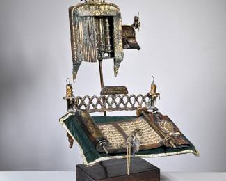 Bronze & Wood Torah Sculpture | An unusual bronze Torah sculpture attached to a wood stand, no apparent signature, in the manner of Haim Hendin. - h. 21.75 x w. 12 x d. 13 in
