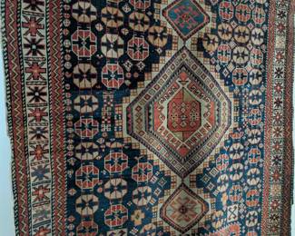 ANTIQUE MIDEASTERN RUG