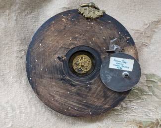 BACK OF WALL CLOCK