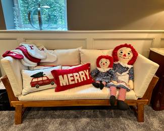Futon. Raggedy Ann dolls